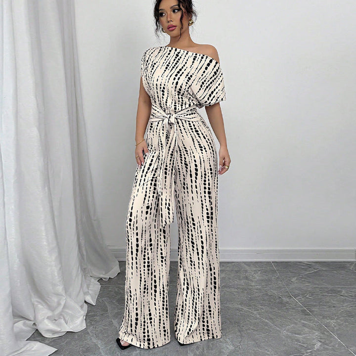 Olivia | Einteiliger, weit geschnittener Jumpsuit mit One-Shoulder-Träger und Print