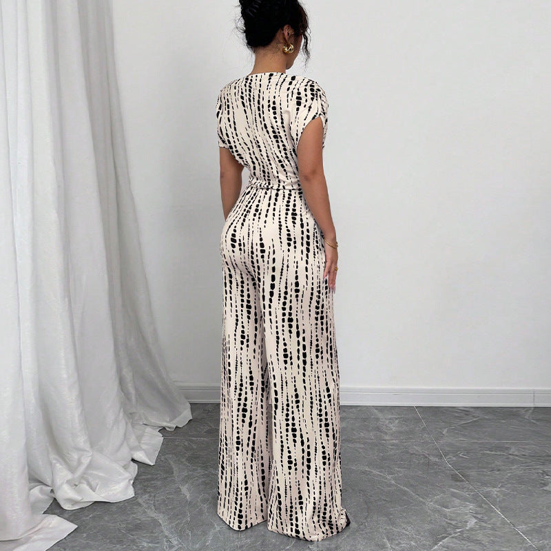 Olivia | Einteiliger, weit geschnittener Jumpsuit mit One-Shoulder-Träger und Print