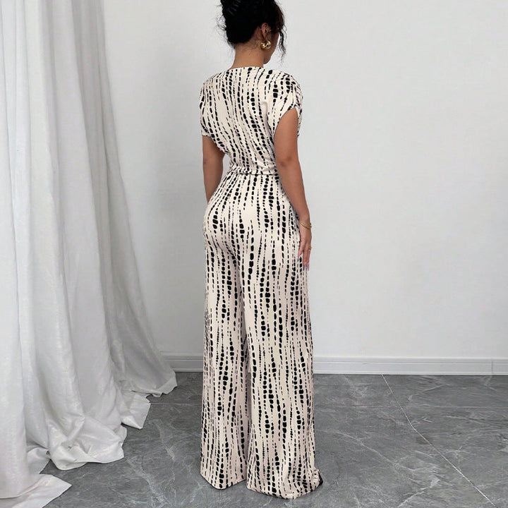 Olivia | Einteiliger, weit geschnittener Jumpsuit mit One-Shoulder-Träger und Print