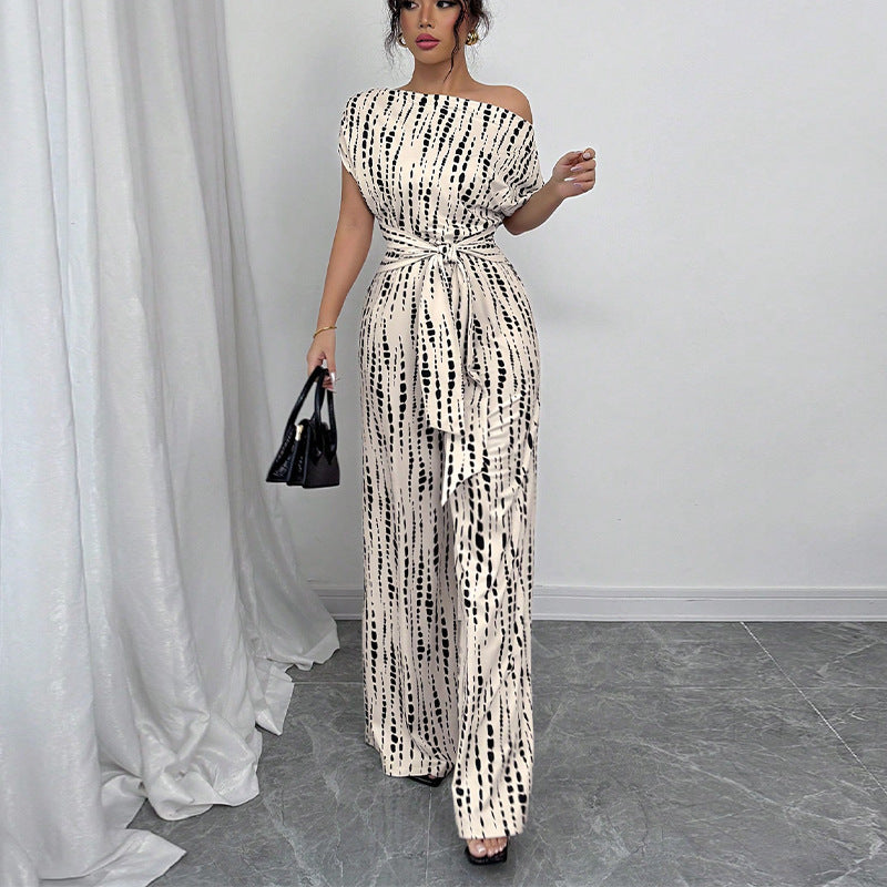 Olivia | Einteiliger, weit geschnittener Jumpsuit mit One-Shoulder-Träger und Print